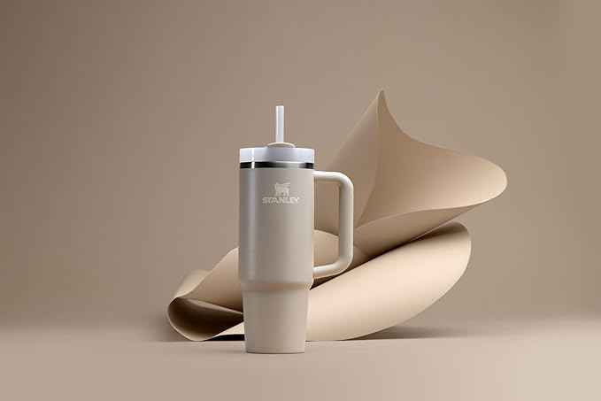 STANLEY Quencher H2.0 Tumbler with Handle and Straw 30 Fluid Ounces| Flowstate 3-Position Lid | Cup Holder Compatible for Travel | Insulated Stainless Steel Cup | BPA-Free | Exclusive Toasted Almond