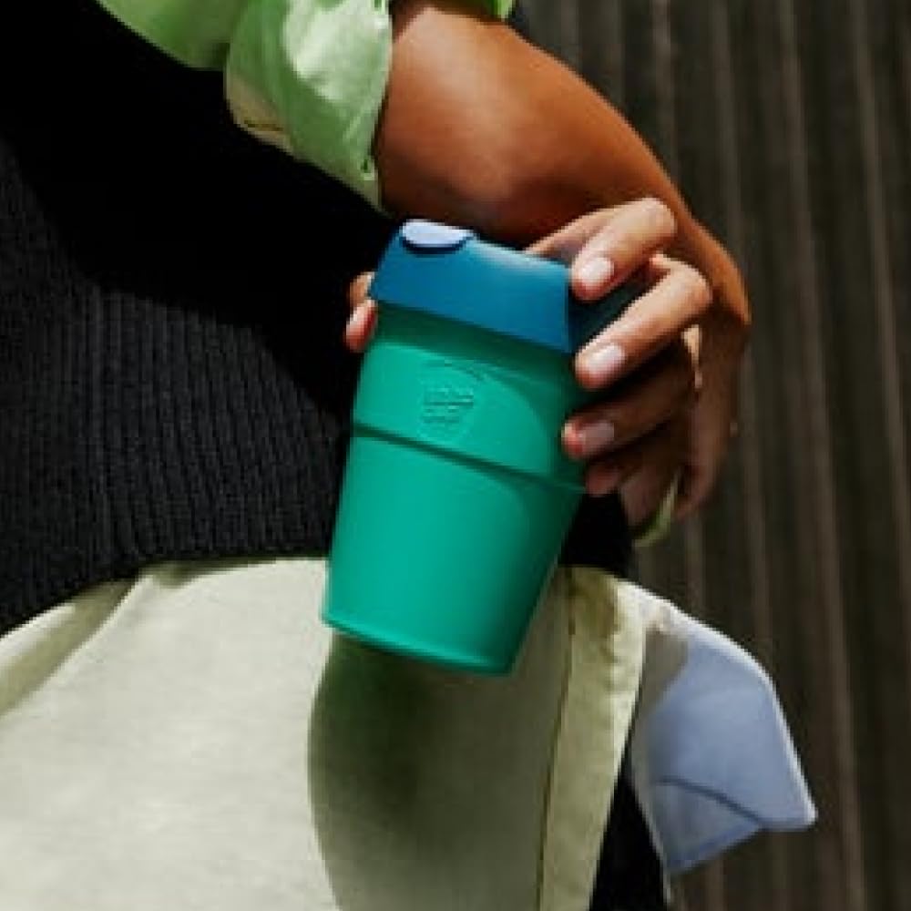 Reusable 12 oz coffee cup shown with press-fit lid