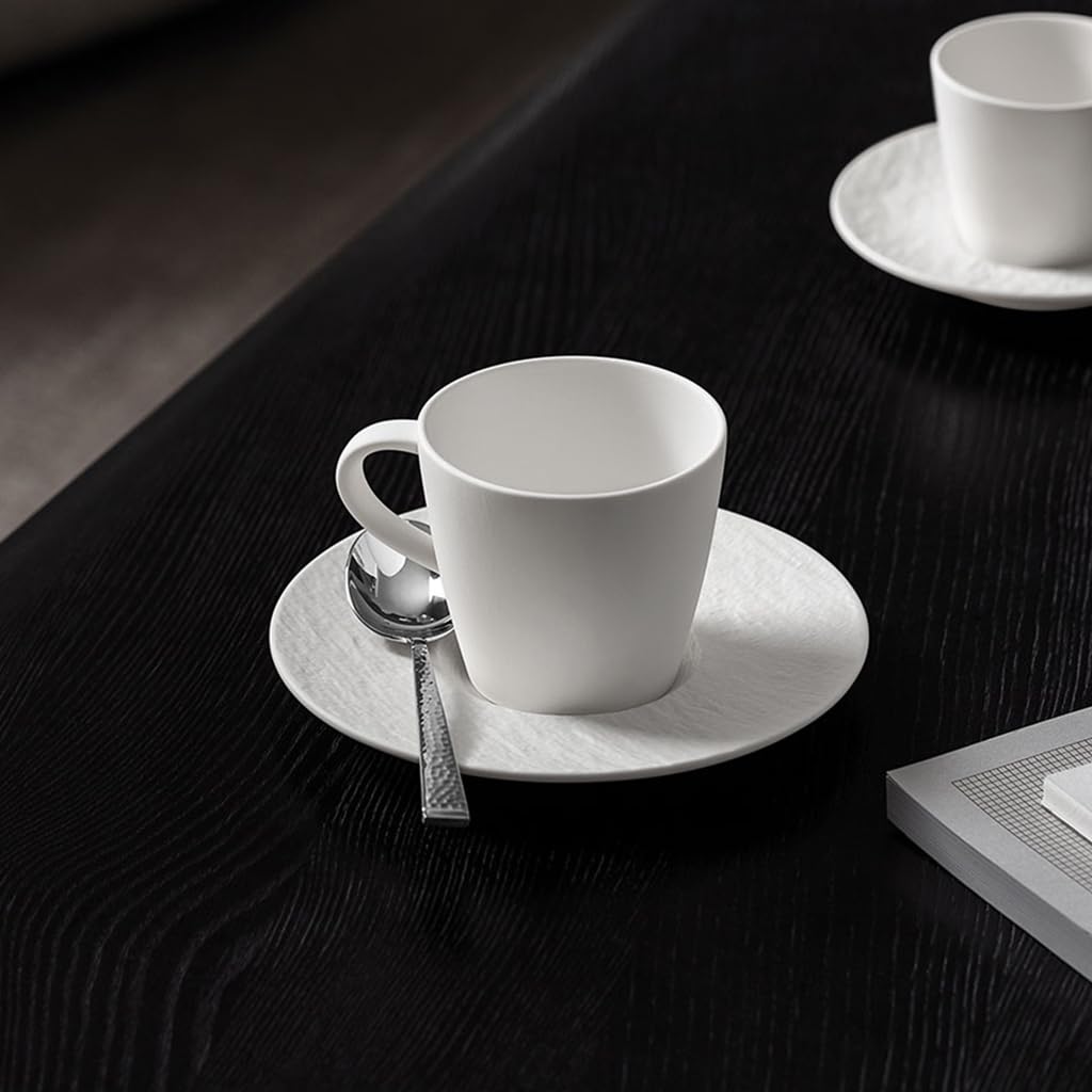 White porcelain coffee cup shown from the side