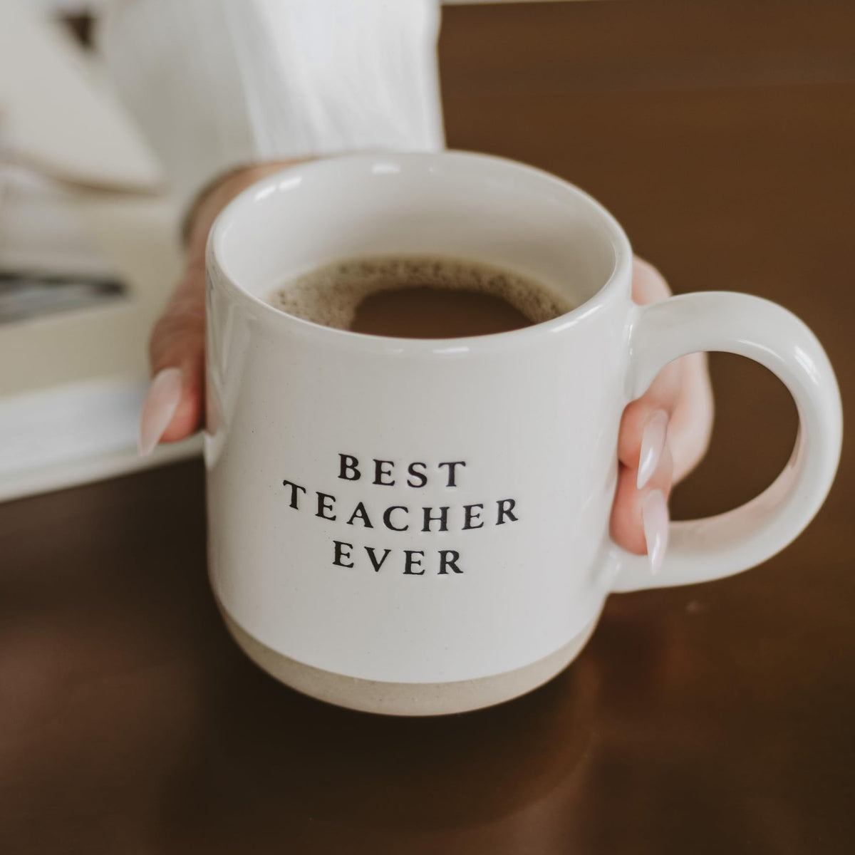 Stoneware mug with minimalist black text design