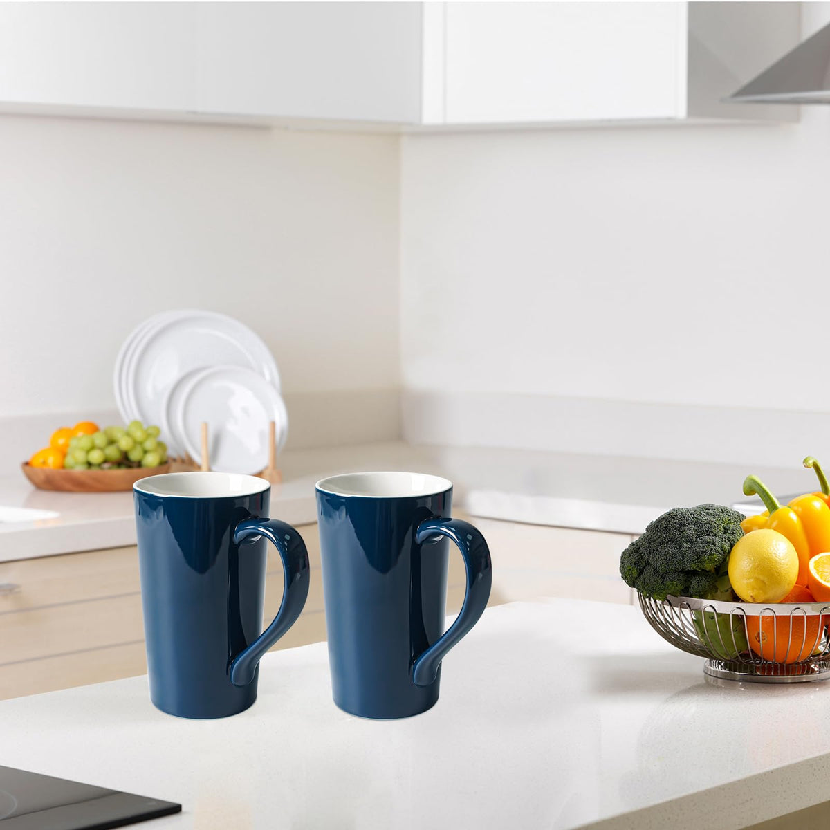 Two matching blue mugs side by side
