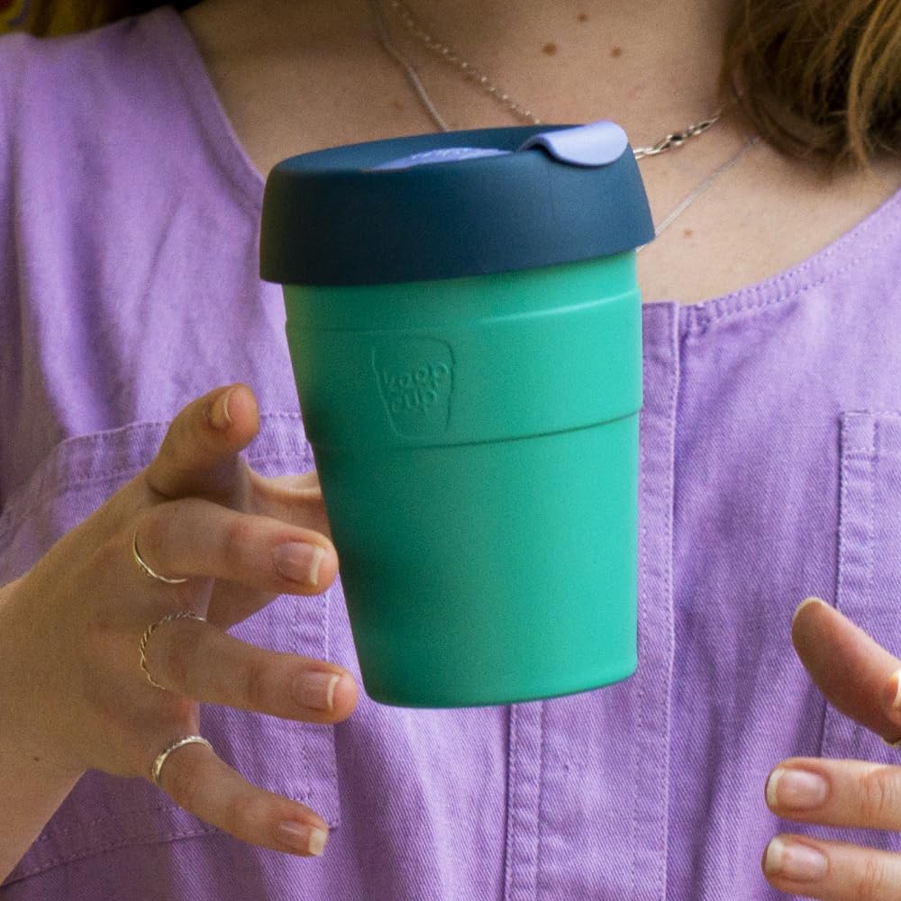 Stainless steel coffee cup with lid removed