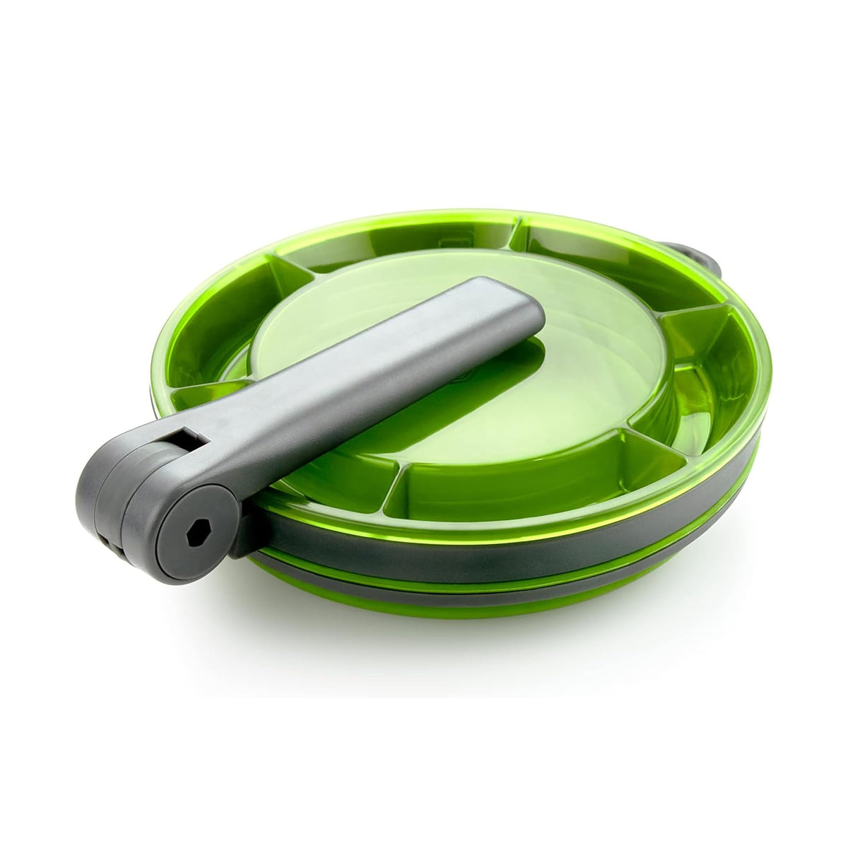Green foldable mug collapsed into a flat disc