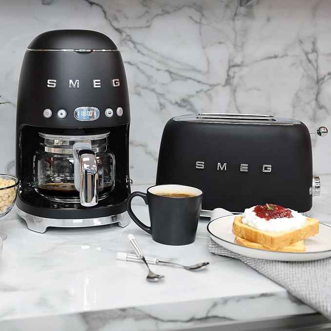 Smeg 50's Retro Style Aesthetic Drip Coffee Machine with 10 Cup Glass Carafe, Auto Start Feature, Keep Warm Plate, and Two Coffee Strength Settings (Matte Black)