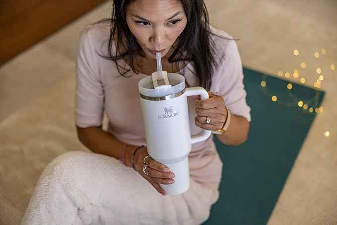 STANLEY Quencher H2.0 Tumbler with Handle and Straw 40 oz | Flowstate 3-Position Lid | Cup Holder Compatible for Travel | Insulated Stainless Steel Cup | BPA-Free | Frost