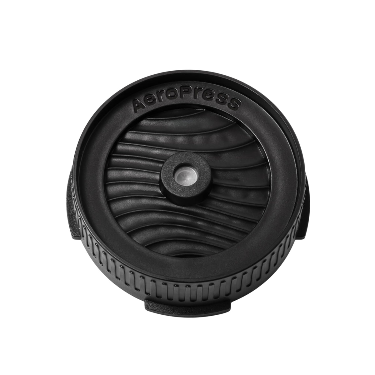 Black flow control filter cap with pressure-activated valve