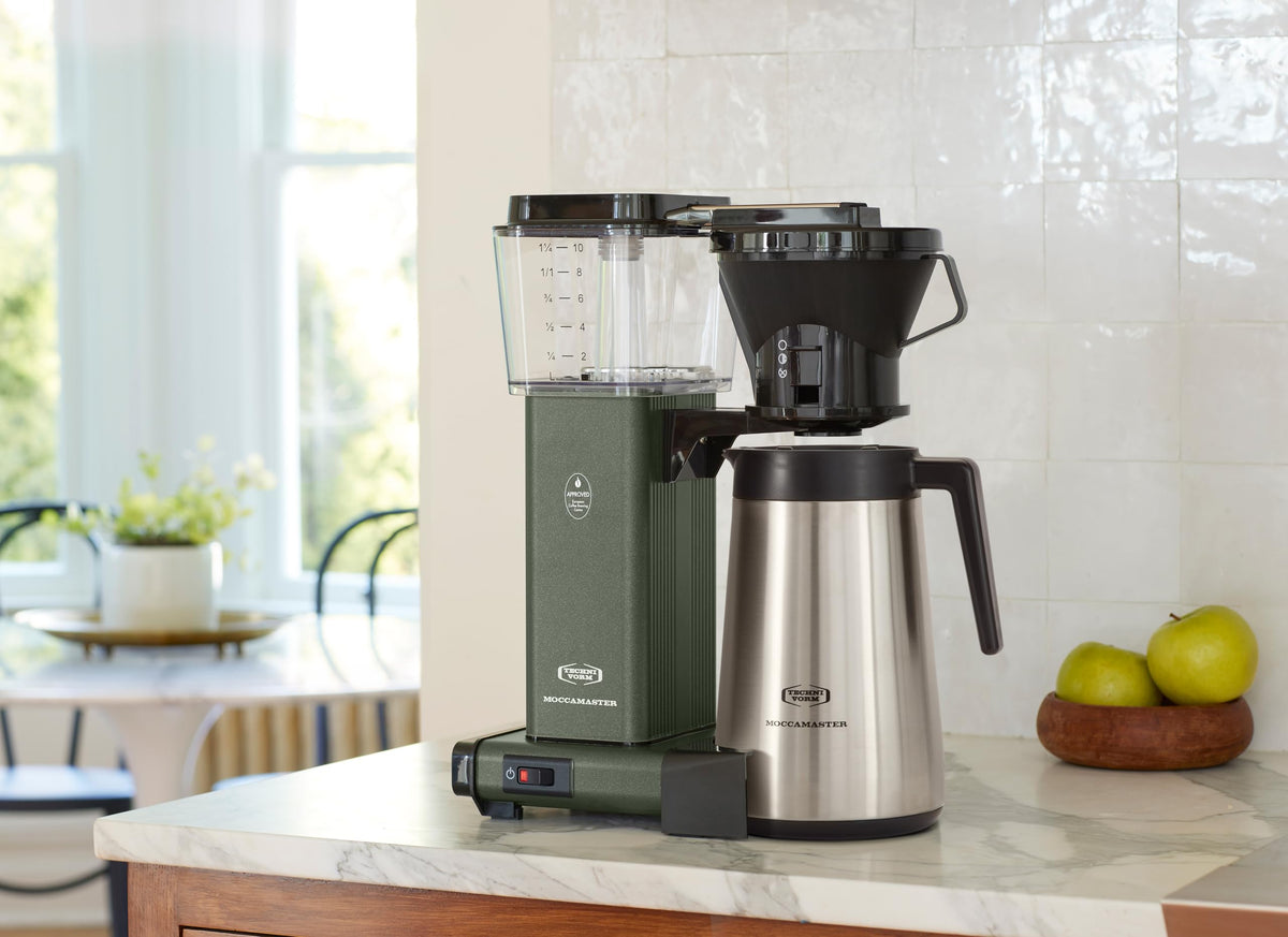 Compact drip coffee maker with cone-shaped brew basket