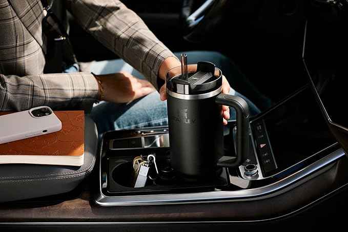 STANLEY Quencher H2.0 Tumbler with Handle and Straw 30 oz | Flowstate 3-Position Lid | Cup Holder Compatible for Travel | Insulated Stainless Steel Cup | BPA-Free | Cranberry