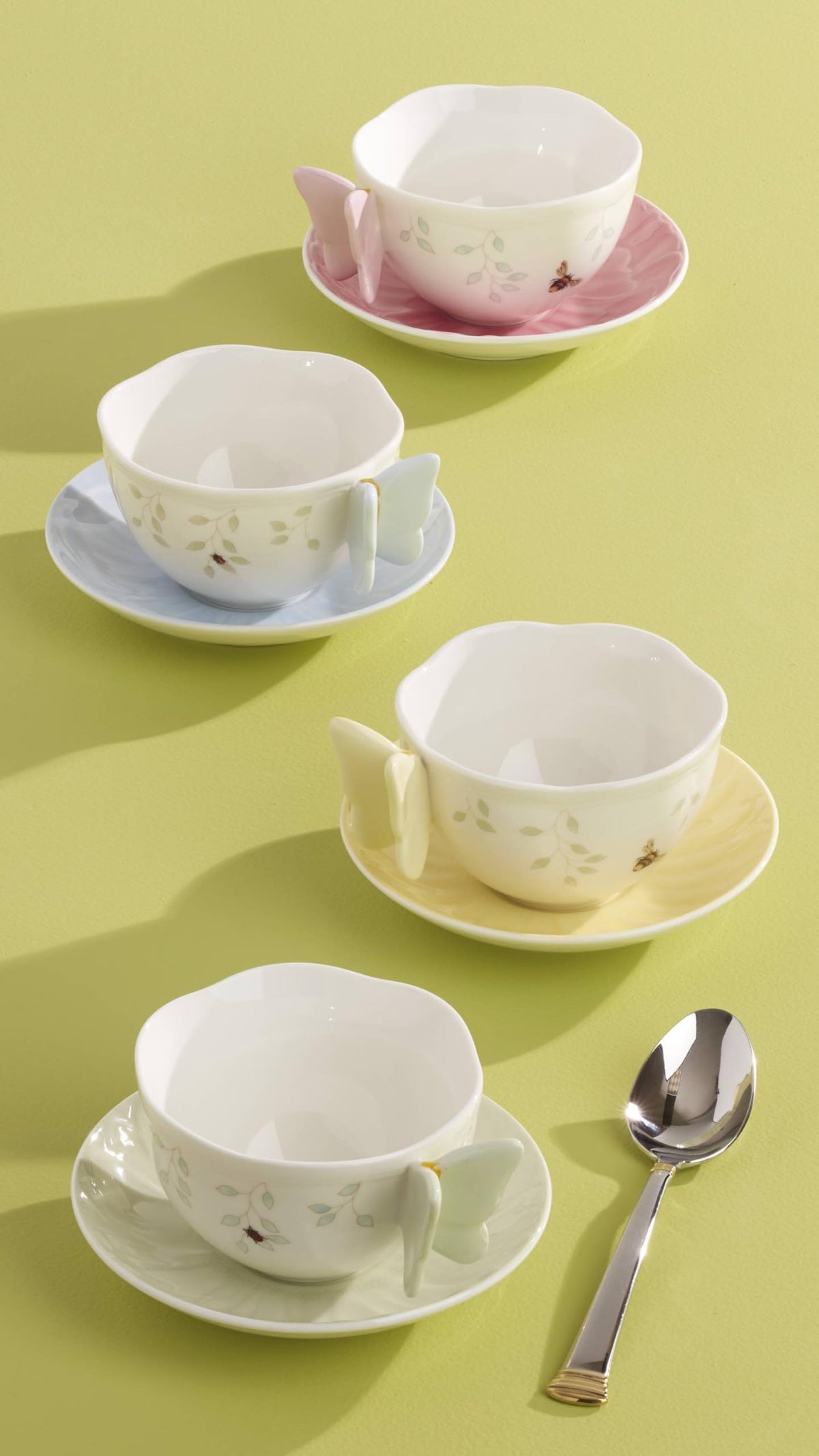 Pink floral and butterfly porcelain teacup and saucer