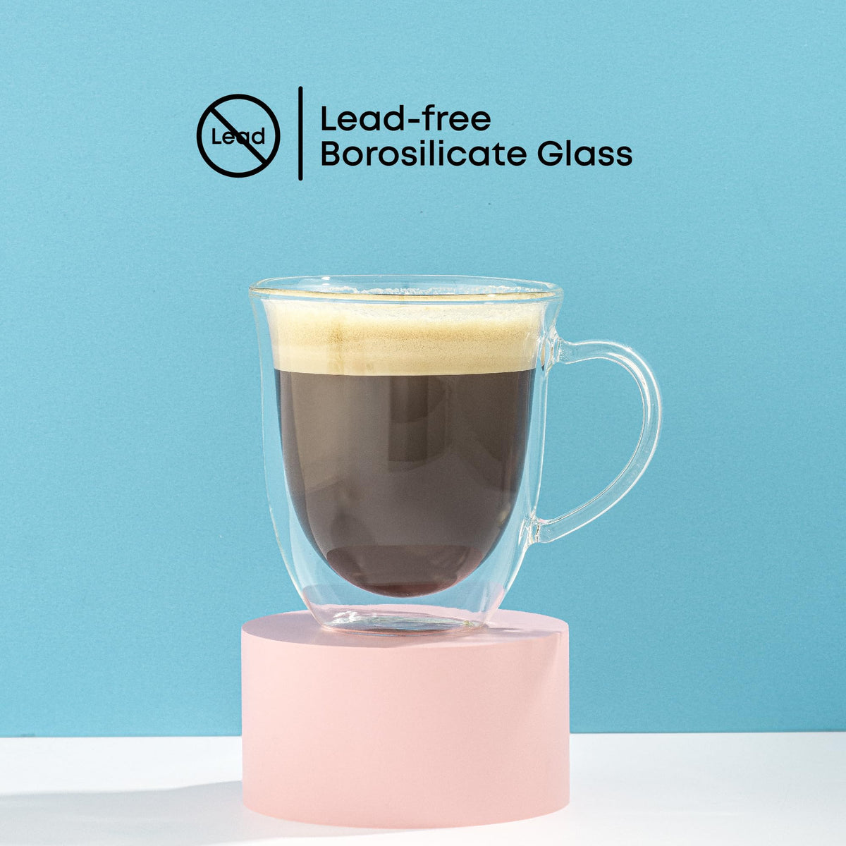 Double wall glass mug filled with a hot drink