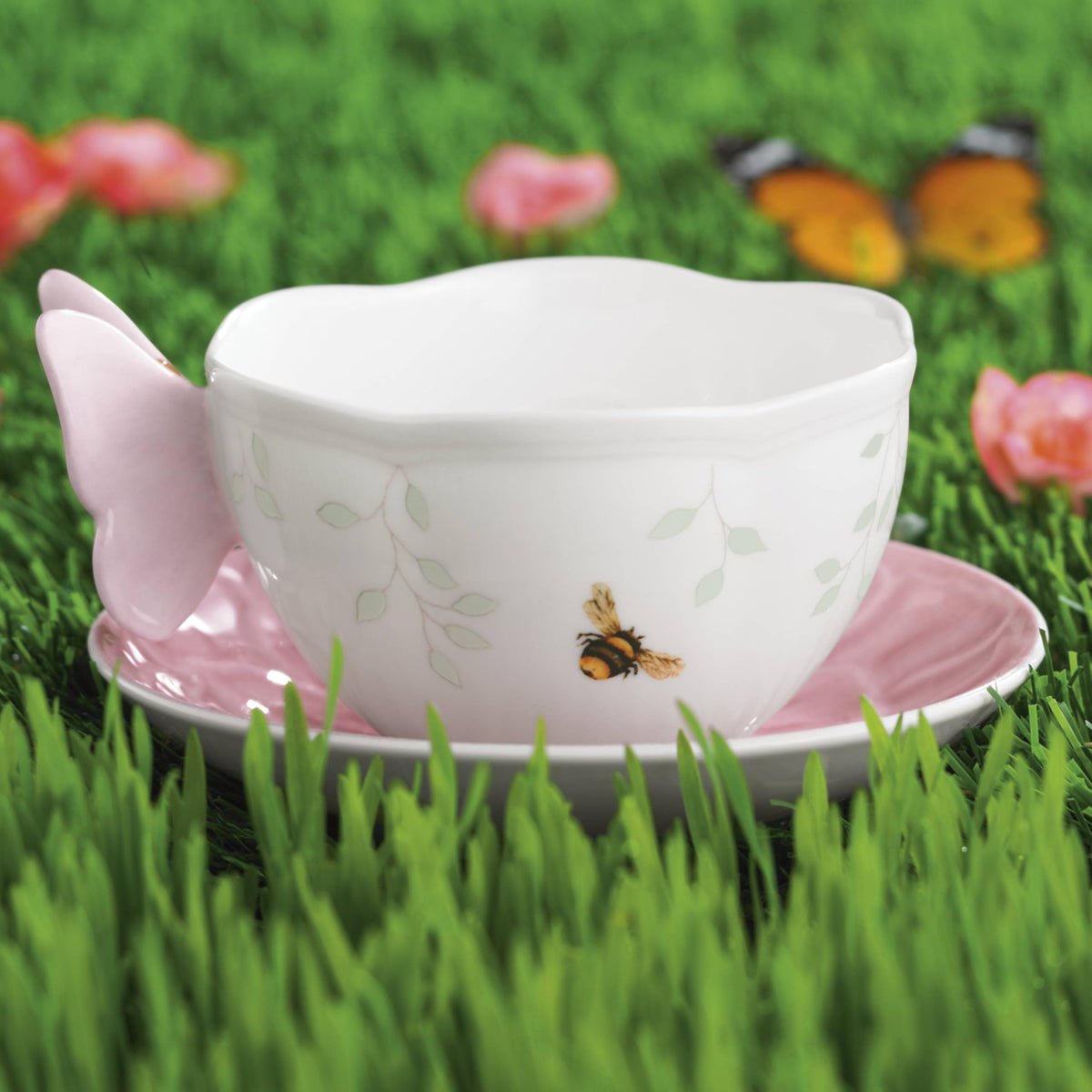 Fluted porcelain saucer with pastel pink wash